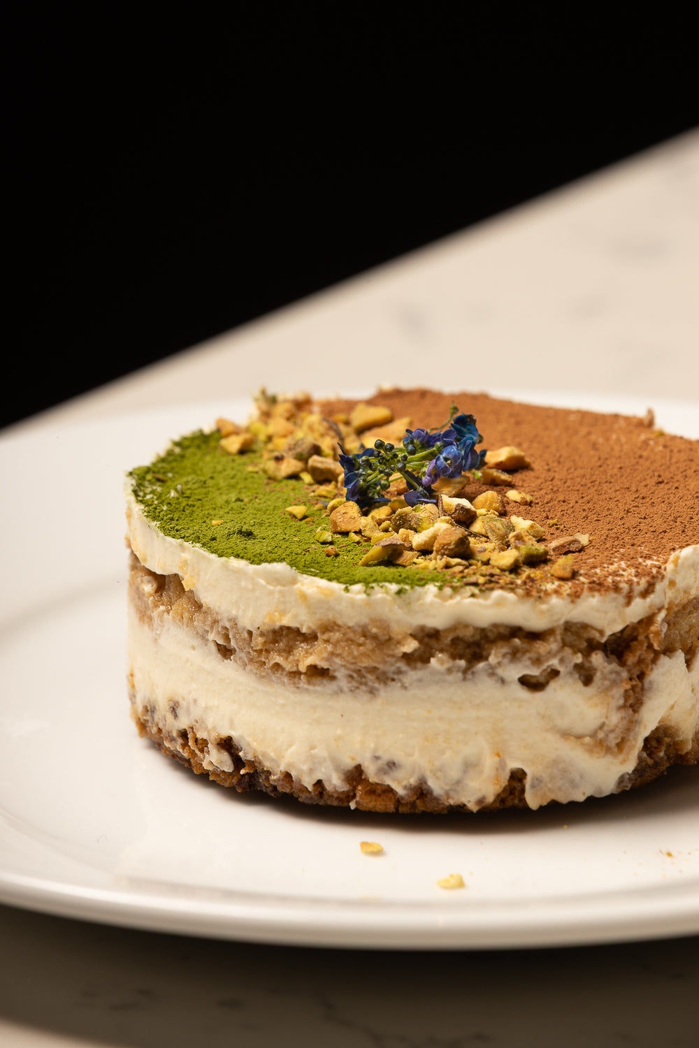 Kyoto Matcha Tiramisu, Pistachio crumble, vanilla biscuit crumb